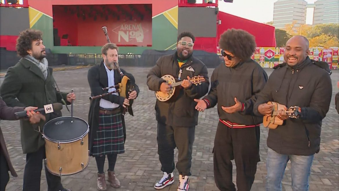 especialista-em-musica-escocesa-toca-gaita-de-fole-com-grupo-de-pagode,-usa-‘saia’-tipica-e-aposta-no-brasil:-‘impossivel-a-escocia-ganhar’
